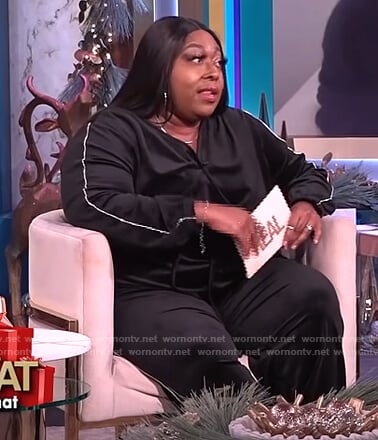 Loni's black embellished trim velour jumpsuit on The Real