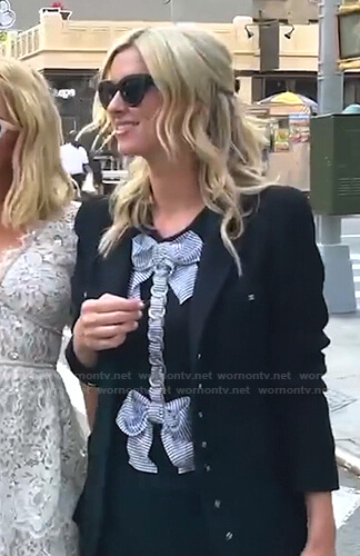 Nicky's black striped bow and chain embellished top on Paris in Love