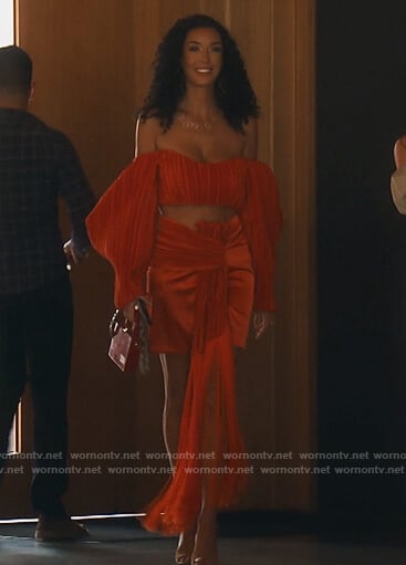 Noella's orange crop top and fringe skirt on The Real Housewives of Orange County