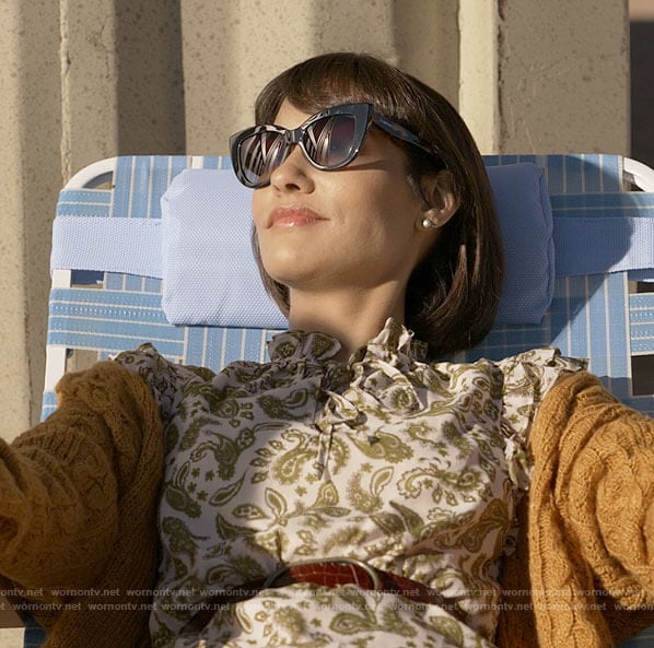 Ren's cat eye sunglasses and belt on Big Sky