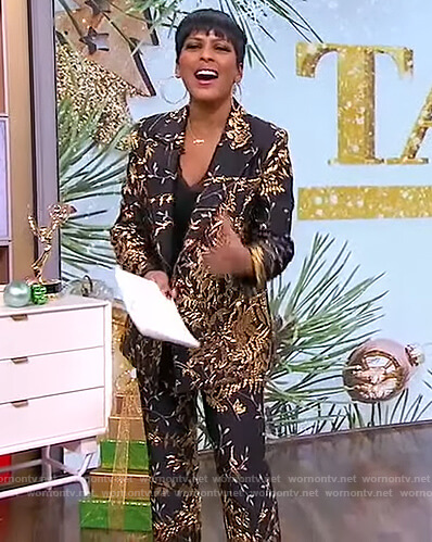 Tamron's black floral metallic blazer and pants on Tamron Hall Show