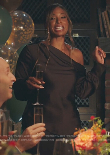Mika's black one off shoulder top on Kenan
