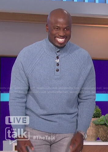 Akbar’s blue sweater with buttons on The Talk
