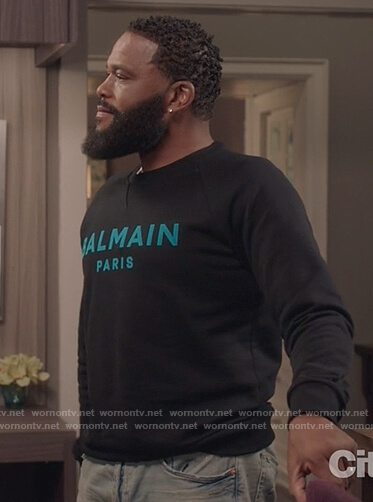 Andre's black Balmain logo sweatshirt on Black-ish