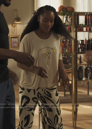 Angela's black and white floral pants on Our Kind of People