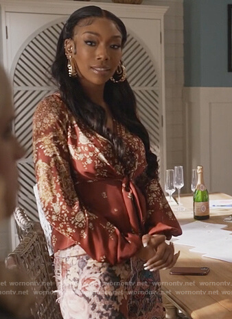 Naomi's red floral print tie waist blouse on Queens