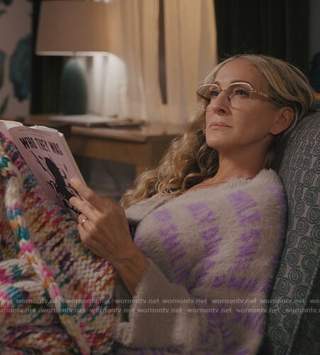 Carrie's fuzzy smile logo sweater on And Just Like That