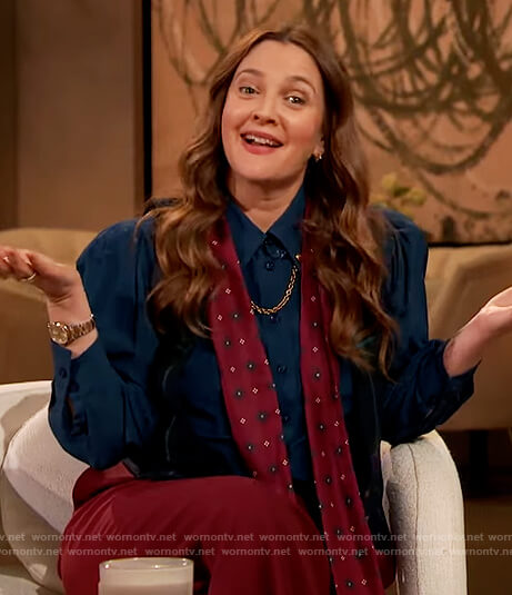 Drew's navy blouse with chain detail on The Drew Barrymore Show