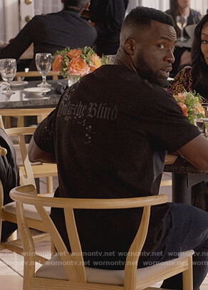 Eric's black Only the Blind tee on Queens