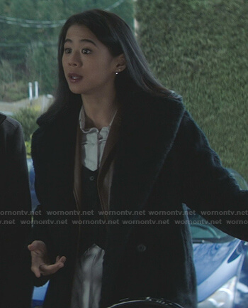 George's black fur coat on Nancy Drew