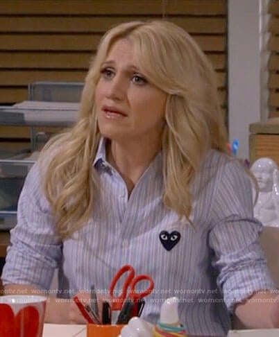 Gina's blue striped shirt with heart on B Positive