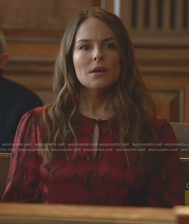 Izzy's red snake print blouse on Bull