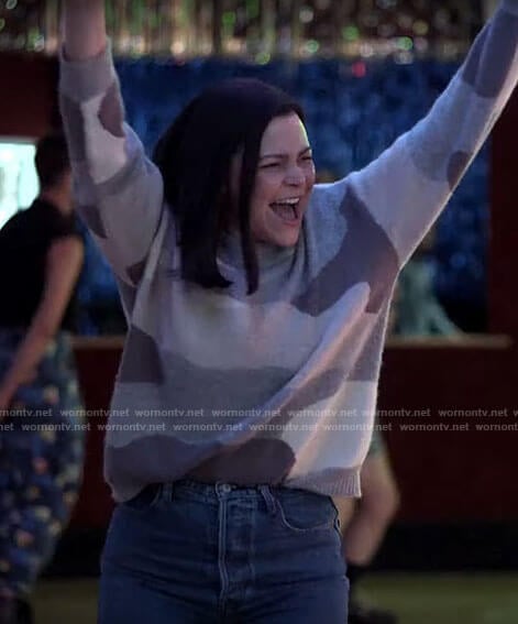 Jodie's grey camo sweater on Pivoting