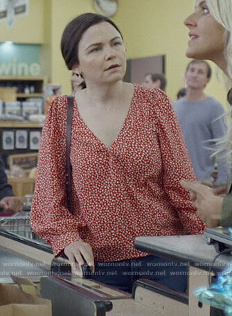 Jodie's red printed top on Pivoting