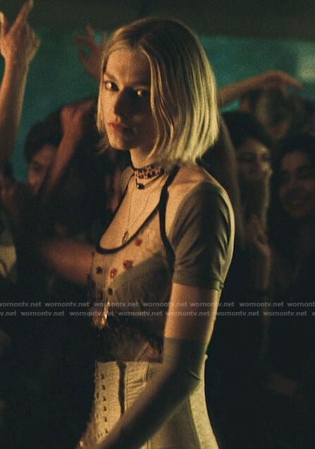 Jules's mesh top, purple bodysuit and lace-up skirt on Euphoria