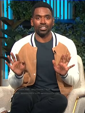 Justin's beige and white varsity jacket on E! News Daily Pop