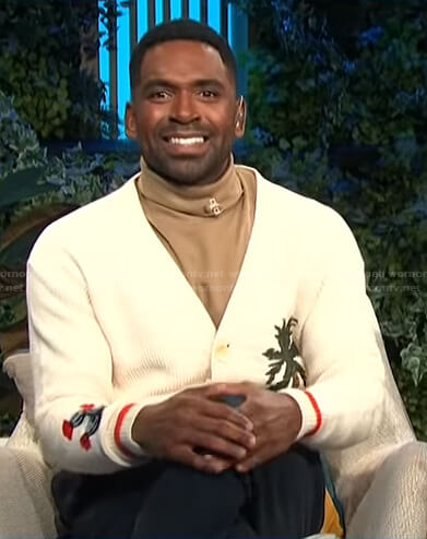 Justin's white embroidered cardigan on E! News Daily Pop