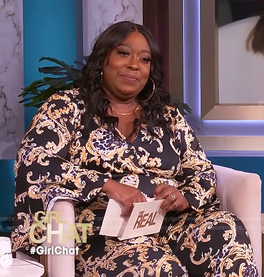 Loni's black printed jumpsuit on The Real