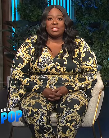 Loni's black printed jumpsuit on E! News Daily Pop