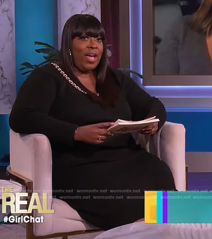 Loni's black chain embellished sweater dress on The Real