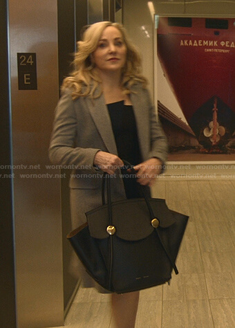 Marissa's grey coat and black tote bag on Bull