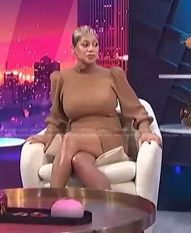 Monique’s brown ribbed puff sleeve sweater dress on E! News Nightly Pop