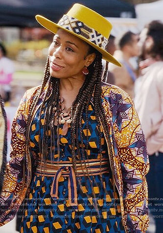 Nya's blue geometric print dress on And Just Like That