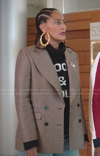 Rainbow's black turtlneck sweater and geometric blazer on Black-ish