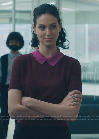 Rian's burgundy contrast sweater on Billions