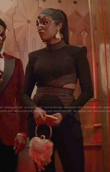 Ryan's black cutout waist jumpsuit on Batwoman