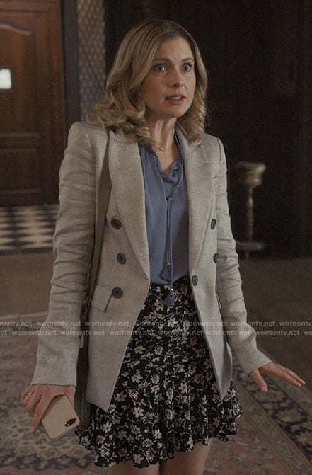 Sam's grey blazer, blue blouse and floral skirt on Ghosts