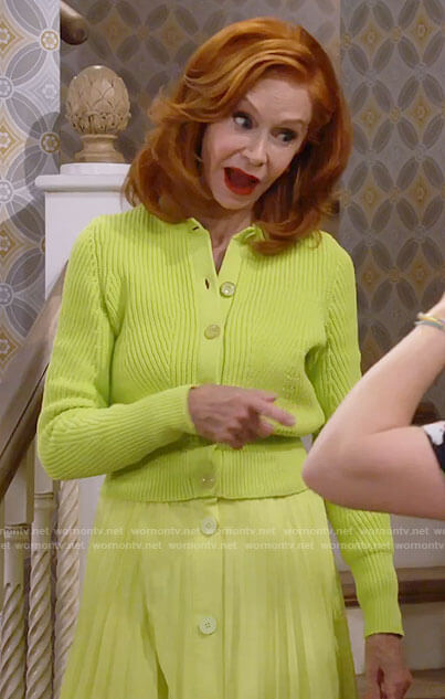 Sheila's lime green cardigan and pleated skirt on Call Me Kat