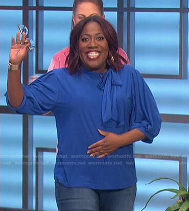 Sheryl's blue tie neck top on The Talk