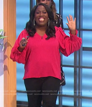 Sheryl's pink v-neck blouse on The Talk