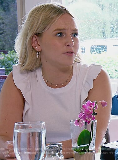 Sophie Beador's white ruffle sleeve tee on The Real Housewives of Orange County