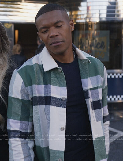 Thomas's green plaid shirt on Queens
