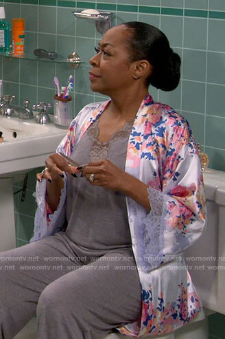 Tina's grey pajamas and floral lace-trim robe on The Neighborhood