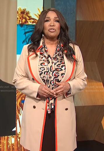 Kym's beige contrast trim coat on E! News Daily Pop