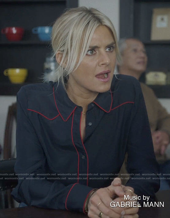 Amy's navy button down blouse with red piping on Pivoting
