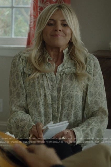 Amy's ivory printed blouse with ruffles on Pivoting