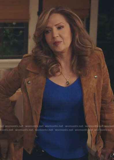 Brown suede moto jacket on Kenan