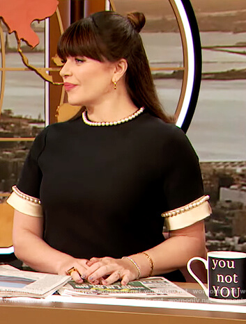 Casey Wilson's black pearl trim dress on The Drew Barrymore Show