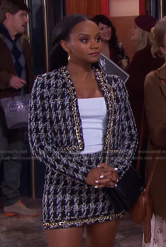 Chanel's black chain detail tweed jacket and skirt on Days of our Lives