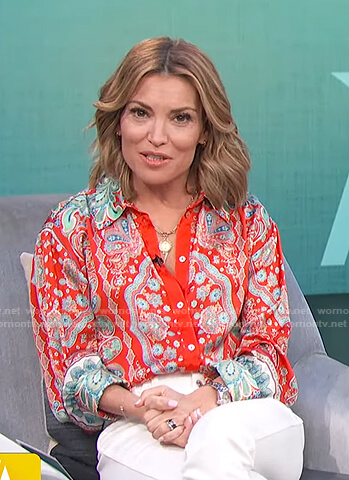 Kit's red floral blouse on Access Hollywood