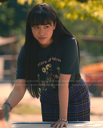Lily's black floral tee and purple check mini skirt on Sweet Magnolias