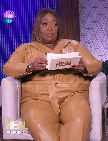 Loni's beige belted leather jumpsuit on The Real