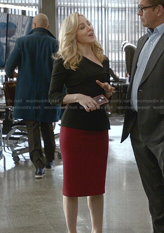 Marissa's black asymmetric neck top and red skirt on Bull