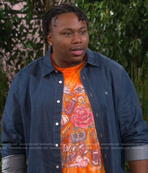 Marty's graphic print t-shirt and denim shirt on The Neighborhood