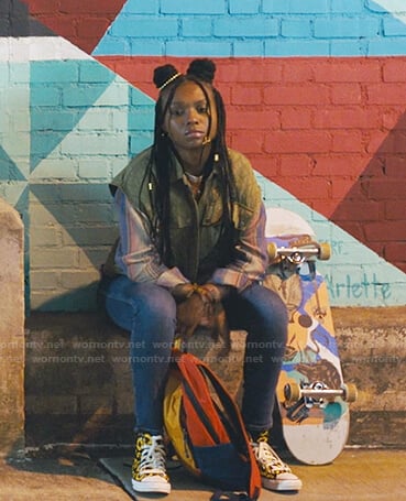Naomi's sunflower print sneakers on Naomi