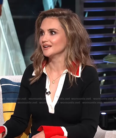 Rachael Leigh Cook's black contrast trim polo sweater on E! News Daily Pop